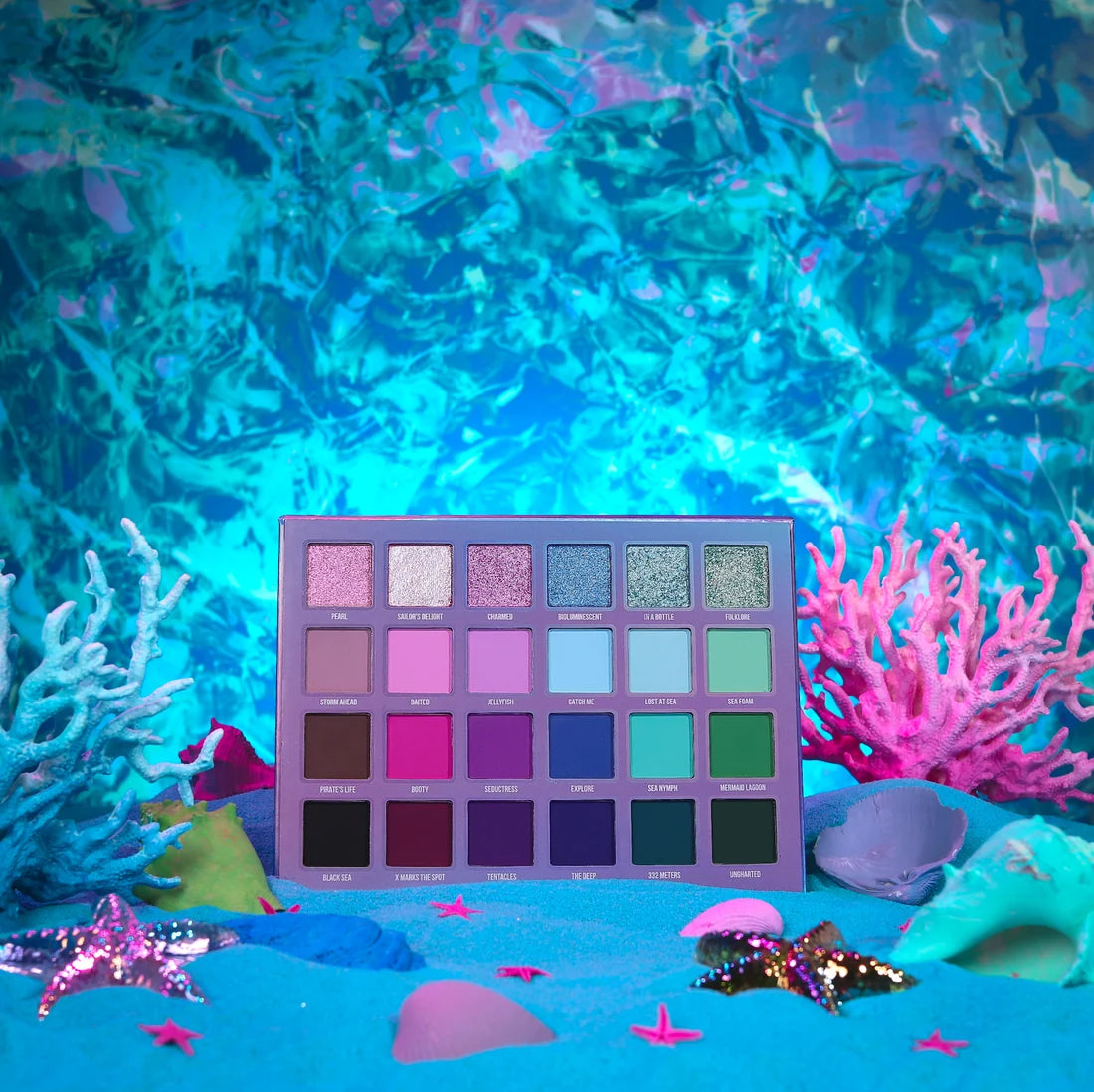 Lure palette open in an underwater scene, six columns running neutral, pink, purple, blue, teal and green from pastel down to near black