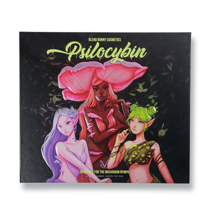 Psilocybin palette closed on white, black cover with green script logo and three painted mushroom nymphs in pink, lilac, and green