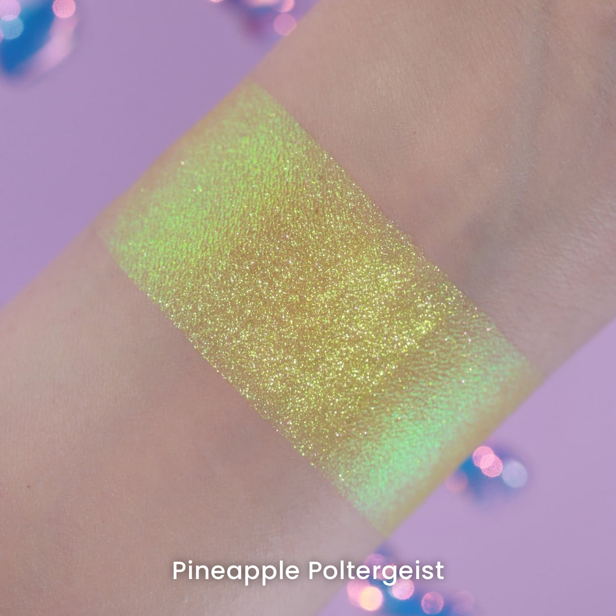 Pineapple Poltergeist arm swatch on light skin