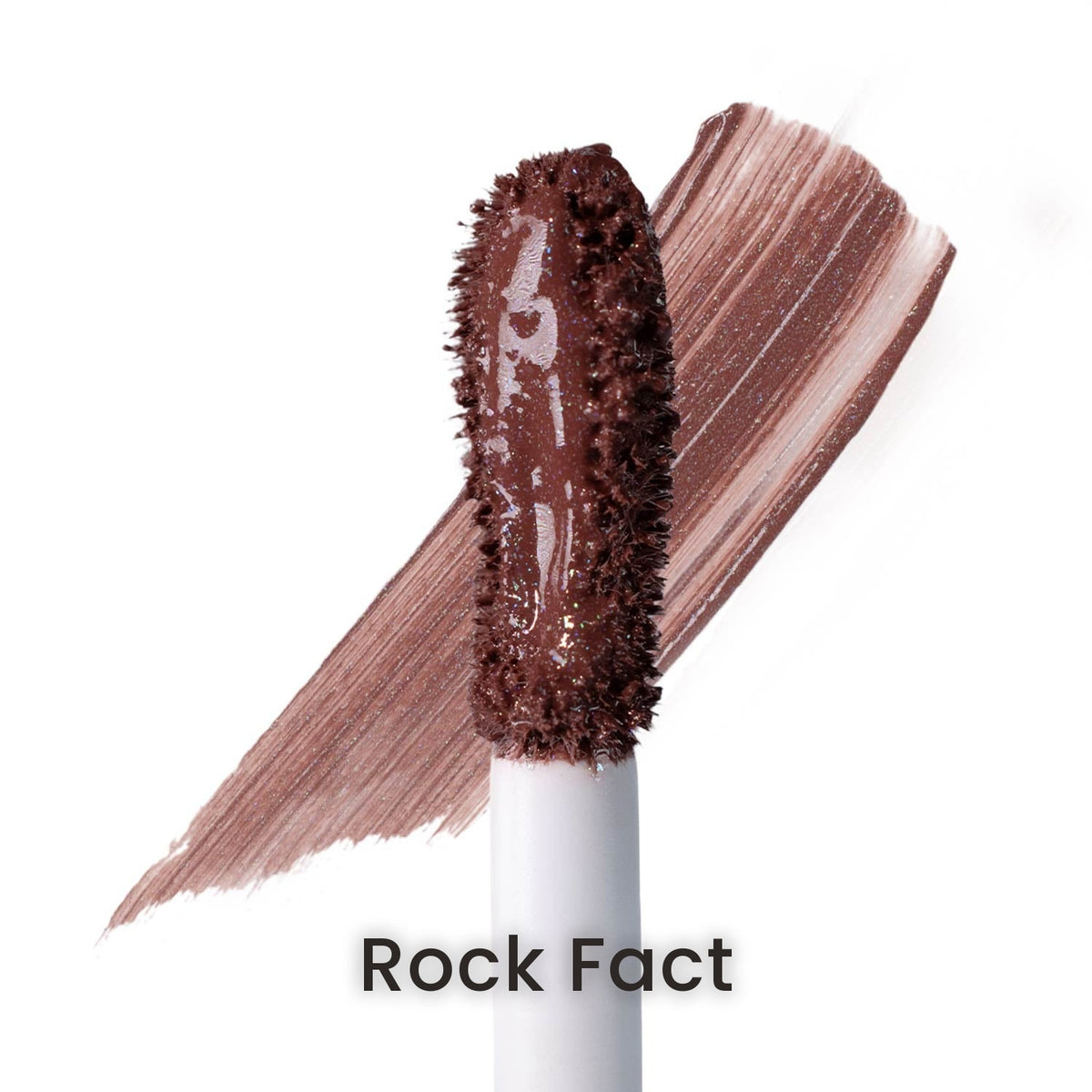 Rock Fact on the applicator beside a swatch stroke, labelled with the shade name