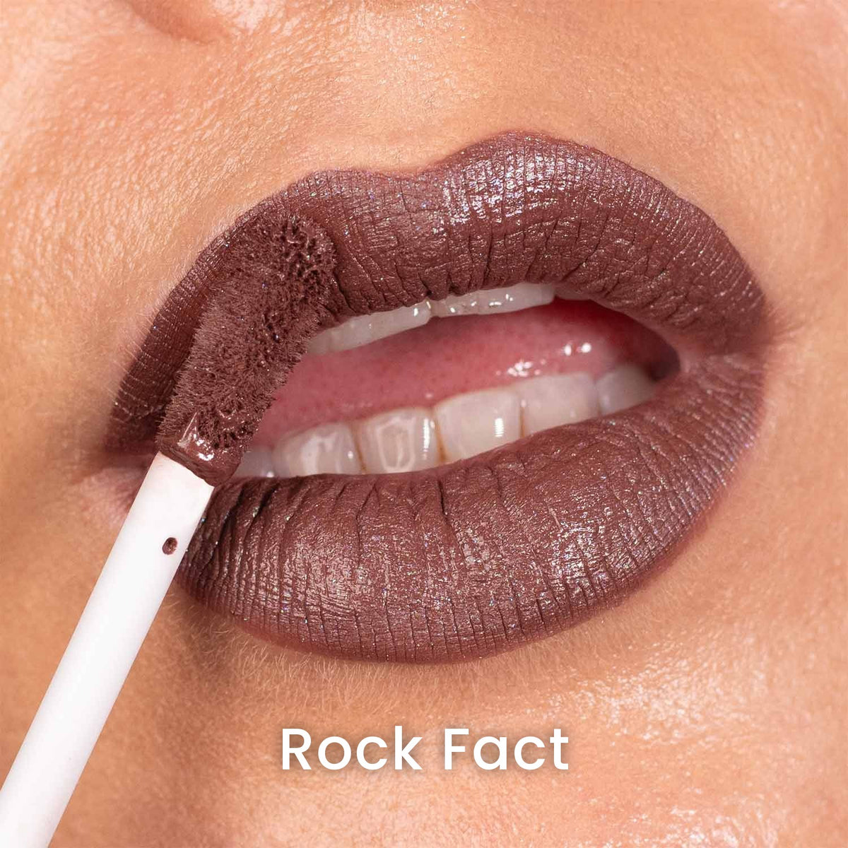 Rock Fact applied on light skin, labelled with the shade name