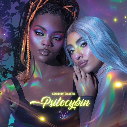 Two models in vivid Psilocybin eye looks, one in coral and teal, one in green and lilac, with holographic light streaks