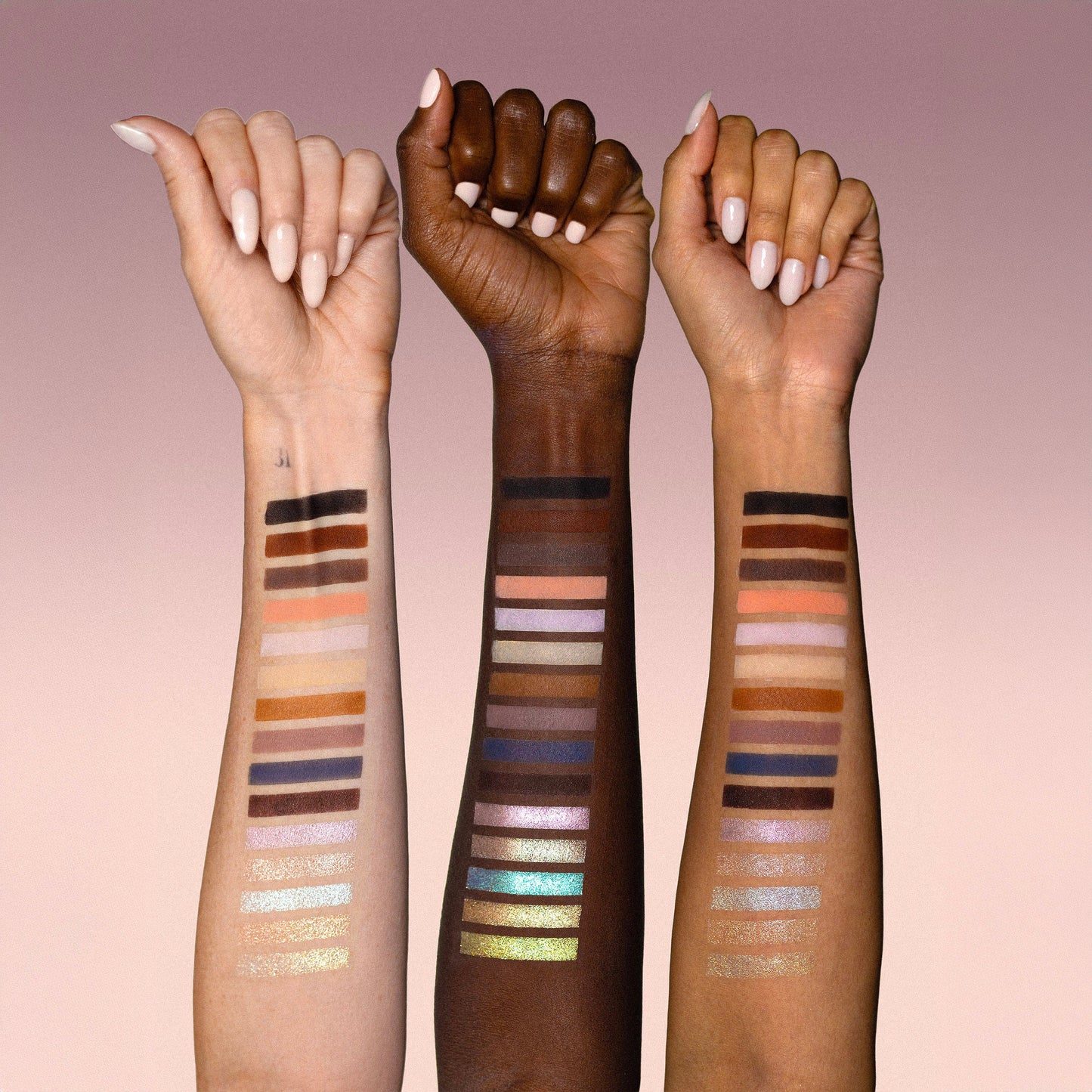 Flora shades swatched on three skin tones from light to deep, across rows of shimmers and mattes