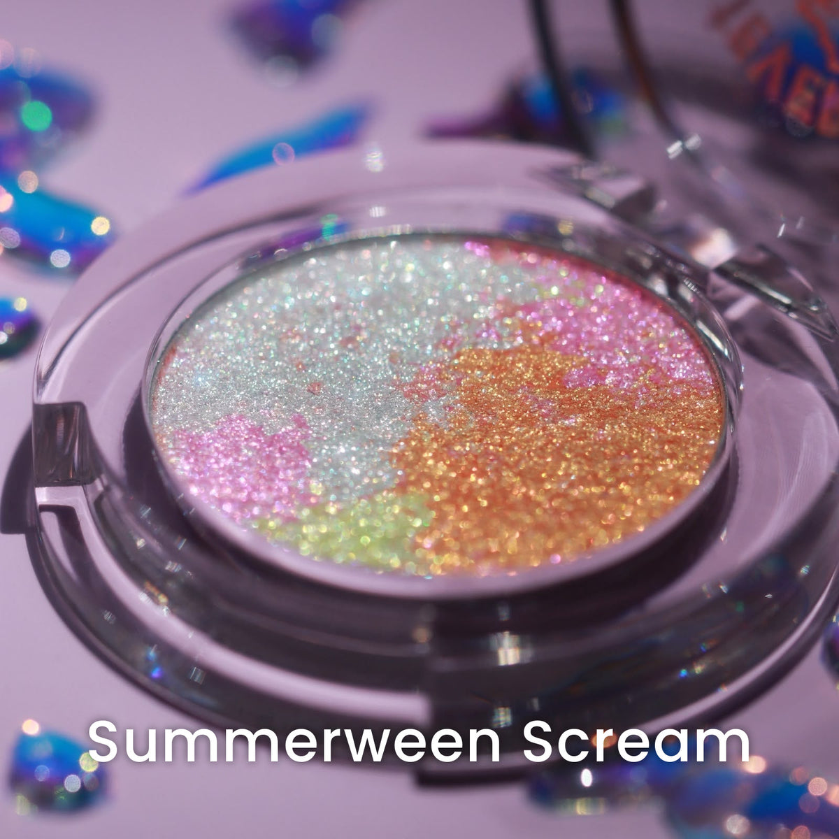 The Summerween Scream compact open on lilac with confetti, silver, pink, green and orange marbling.