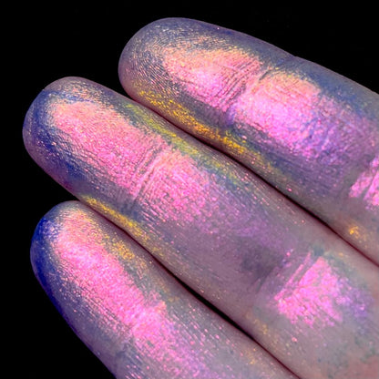 Pink Opaline swatch: indigo shifts through pink to gold with opal iridescence