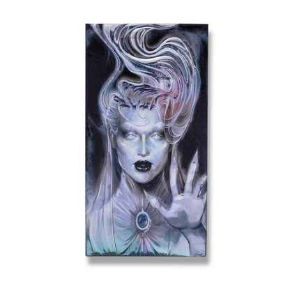 Closed The Final Offering lid, a ghostly figure with flowing white hair, black lips and a cameo brooch raising a clawed hand.