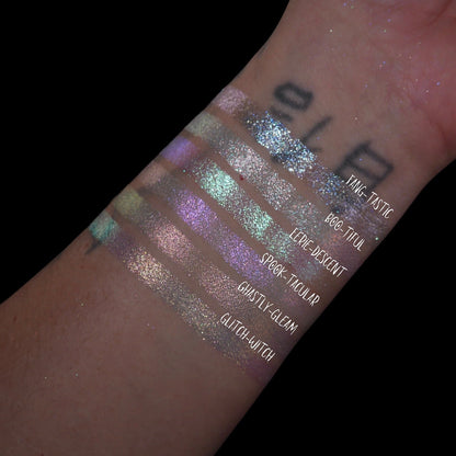 All six Sporkleween singles swatched on light skin against black, labelled, Fang-Tastic at the top