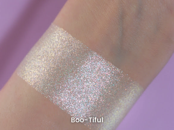 Boo-Tiful swatch on light skin against a lilac backdrop