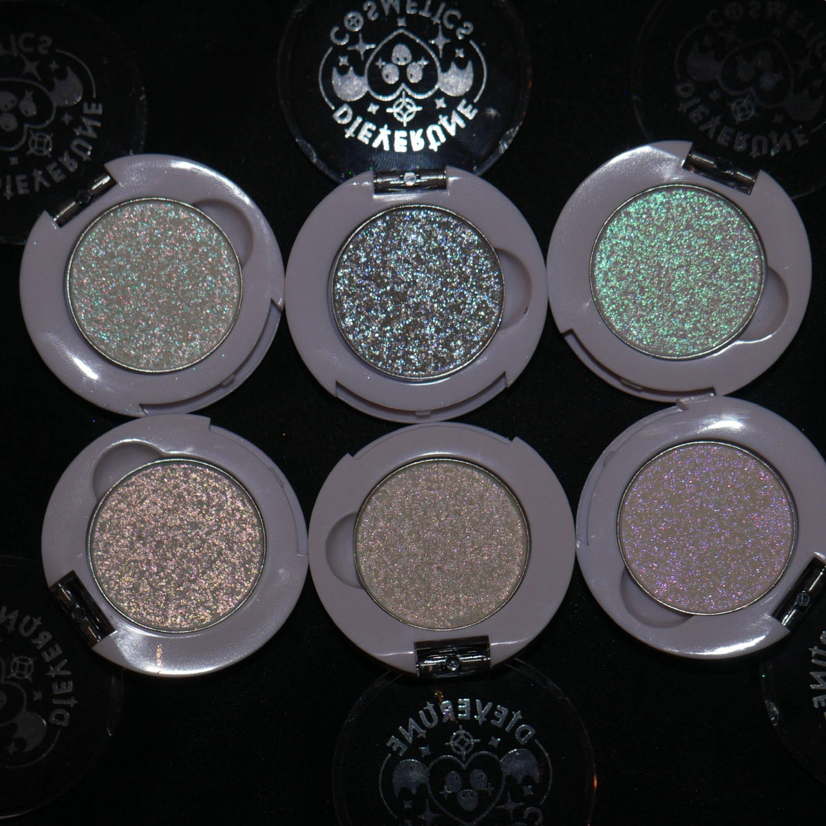 All six Sporkleween singles open in their compacts on black, from the brand's bundle page