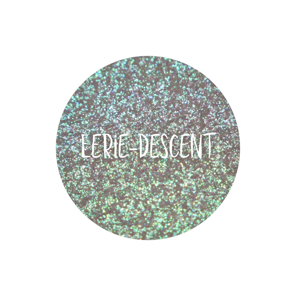 Eerie-Descent pan close-up, labelled: translucent base with a glowy blue to purple and green shift