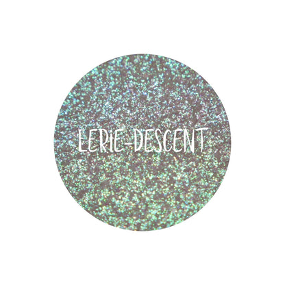 Eerie-Descent pan close-up, labelled: translucent base with a glowy blue to purple and green shift