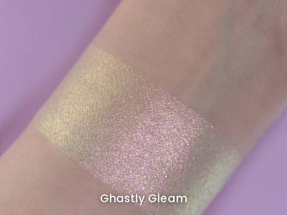 Ghastly Gleam swatch on light skin against a lilac backdrop