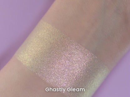 Ghastly Gleam swatch on light skin against a lilac backdrop