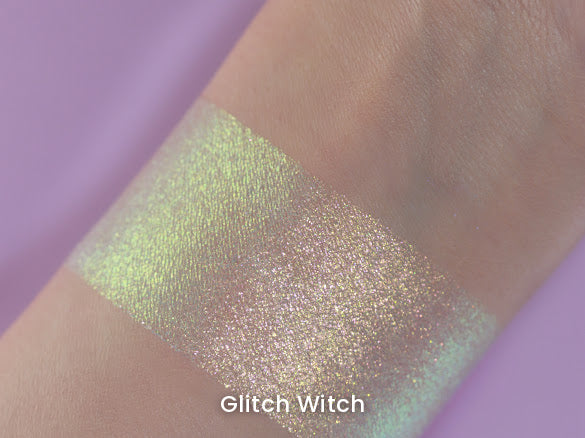 Glitch Witch swatch on light skin against a lilac backdrop