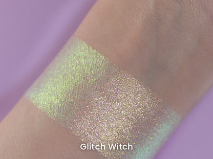Glitch Witch swatch on light skin against a lilac backdrop