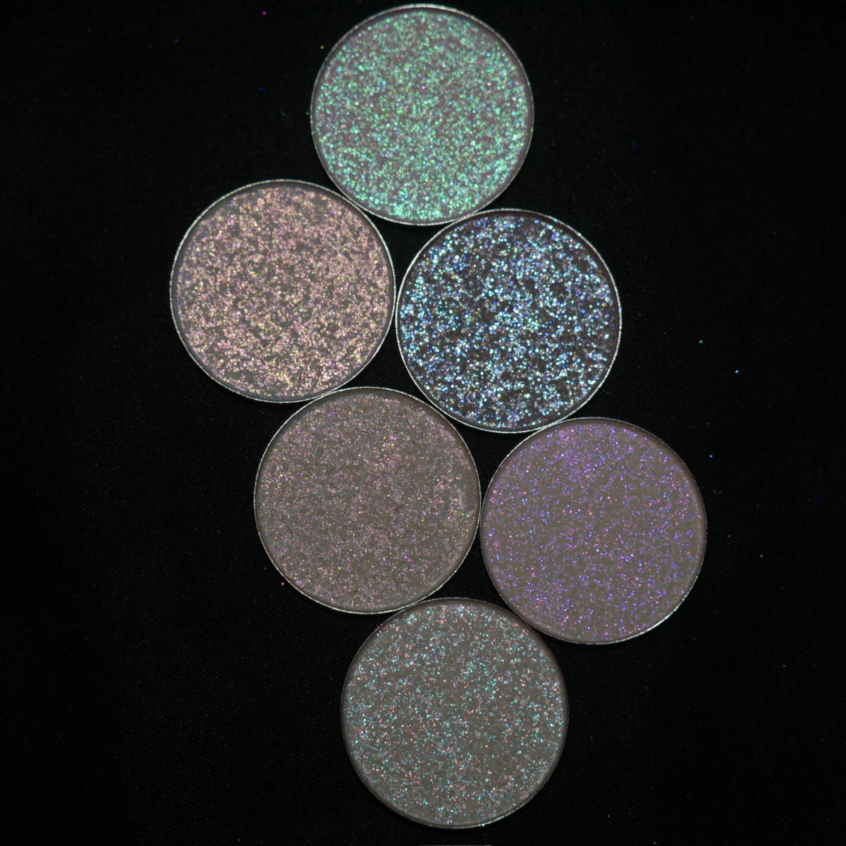 Six loose Sporkleween pans arranged on black, from the brand's bundle page