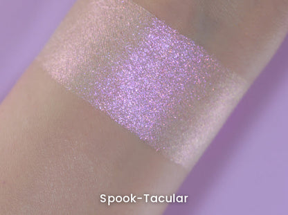 Spook-Tacular swatch on light skin against a lilac backdrop