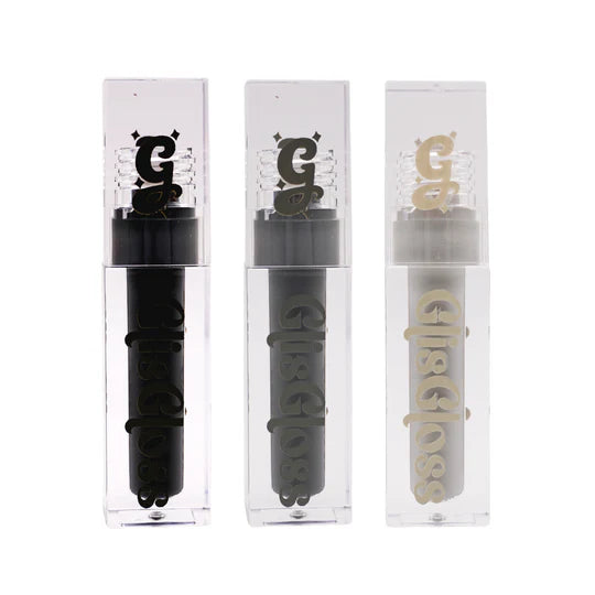 Glis Gloss by Glisten Cosmetics: three clear acrylic tubes lined up showing Liquorice black, Veil dark grey, and Grey Area light grey gloss