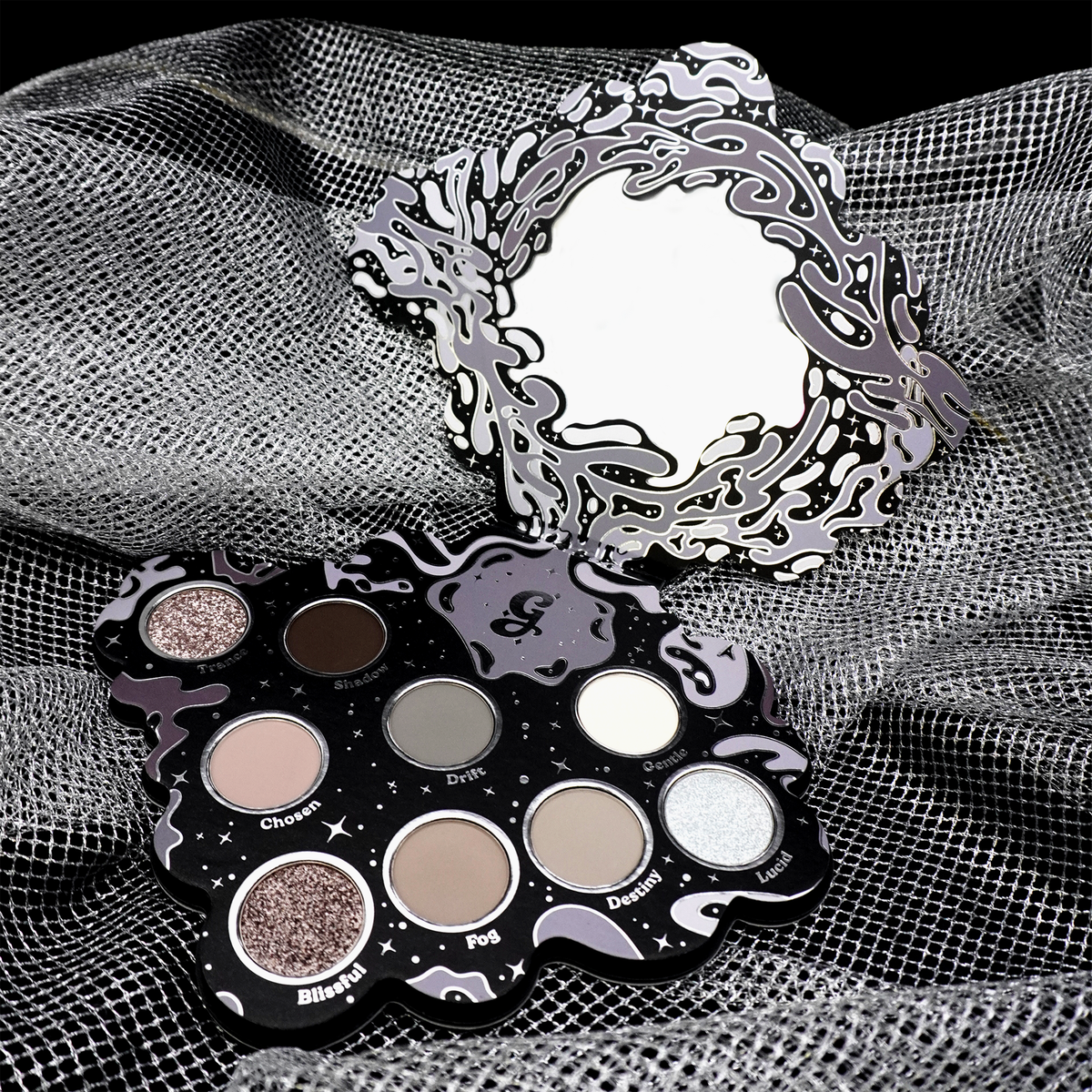 Open Bliss 2.0 palette on grey mesh fabric, mirror lid up above the nine grey pans