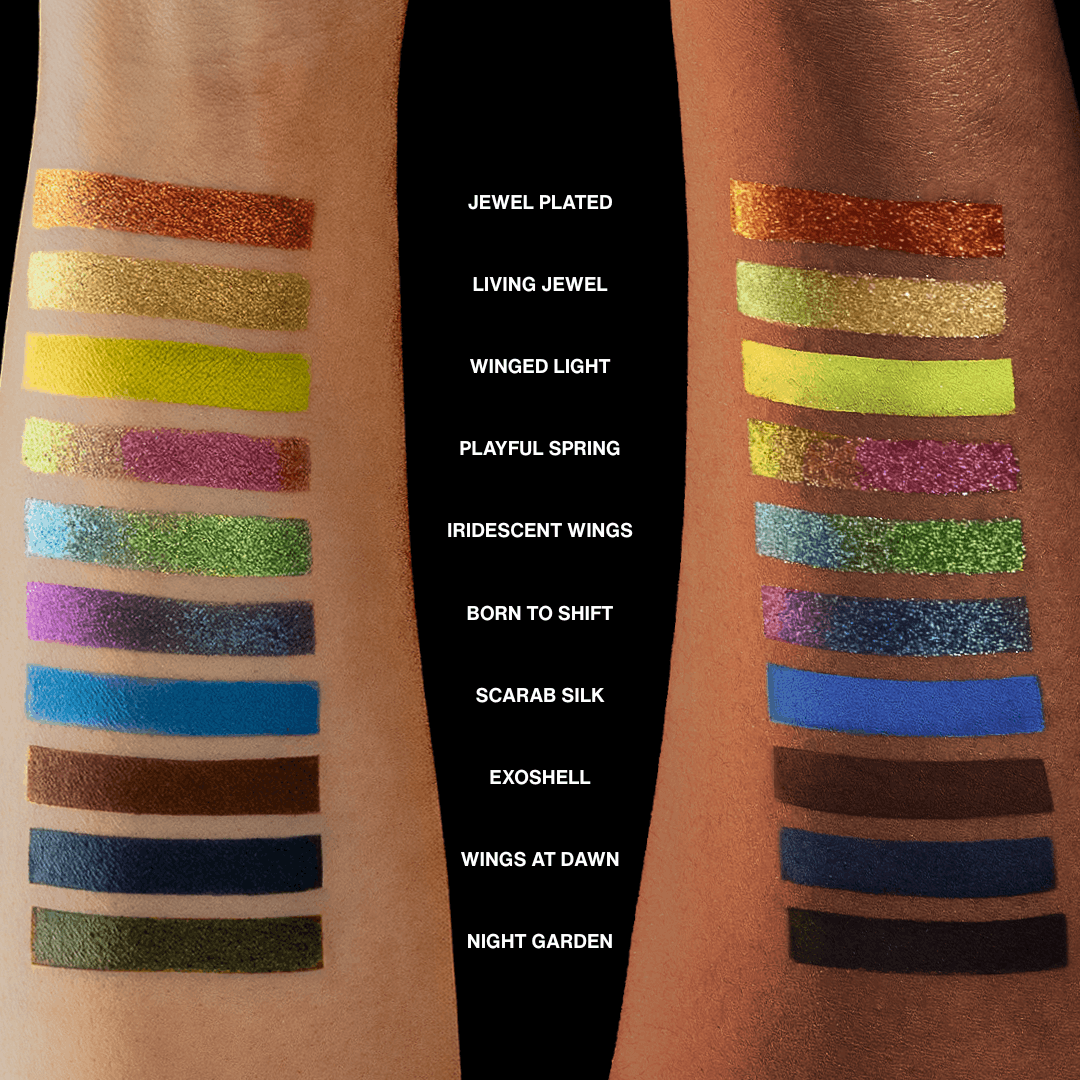 All ten shades swatched as horizontal stripes on two fair forearms, labels listing each name from Jewel Plated to Night Garden down the centre.