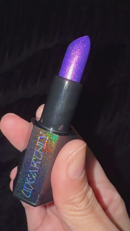 Final Cut bullet turned in the hand to show its violet sparkle