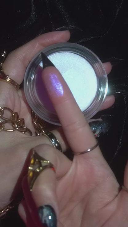 Opening the Phantom jar and swatching the cream on the back of the hand