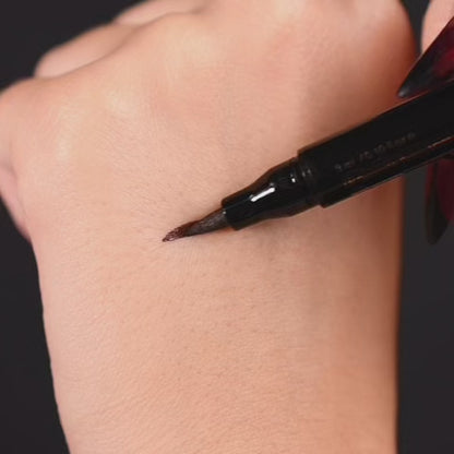 The Conjuring eyeliner pen with a stamp