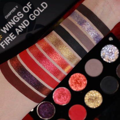 Ten swatch stripes on a fair arm, from lilac sparkle and greys to reds and burgundy, beside the open palette and the Chapter V box title.