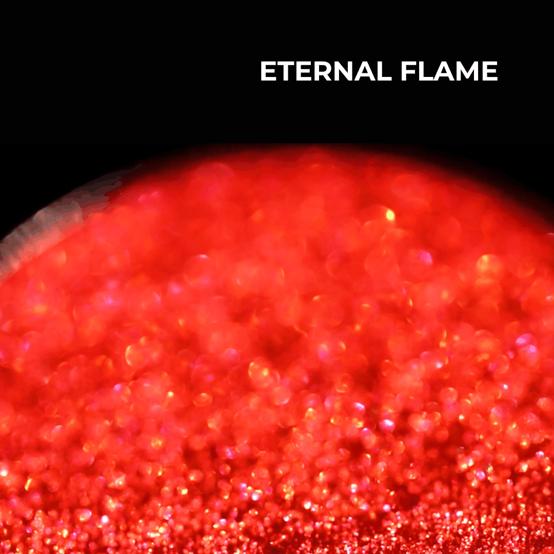 Eternal Flame pan macro: vivid red shimmer with orange sparkle, shade name in white type at the top.