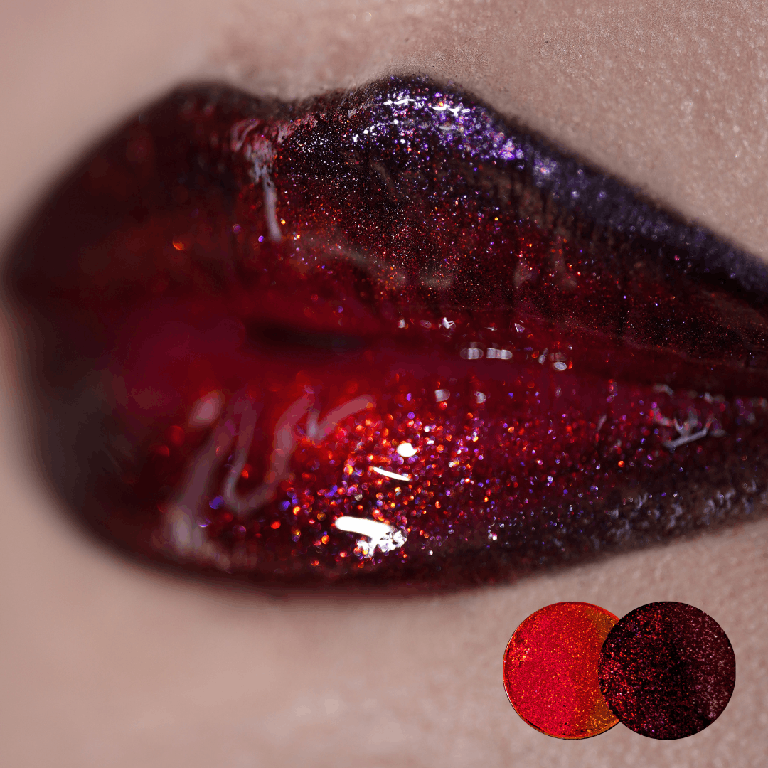 Glossy lips fading from red to deep plum with sparkle, red and dark red sparkle shade dots in the corner.