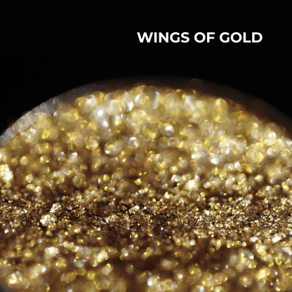 Wings of Gold pan macro: bright gold sparkle, shade name in white type at the top.