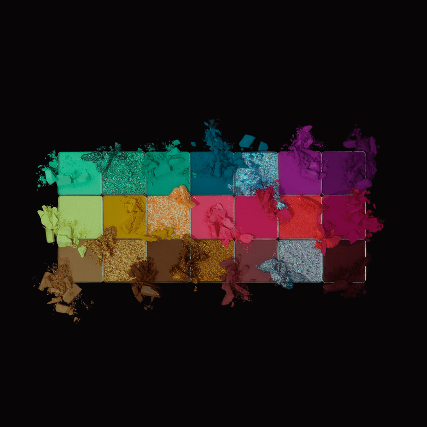 Crushed pans of all 21 shades on black, three rows running mint and teal, yellow and coral, then bronze and berry
