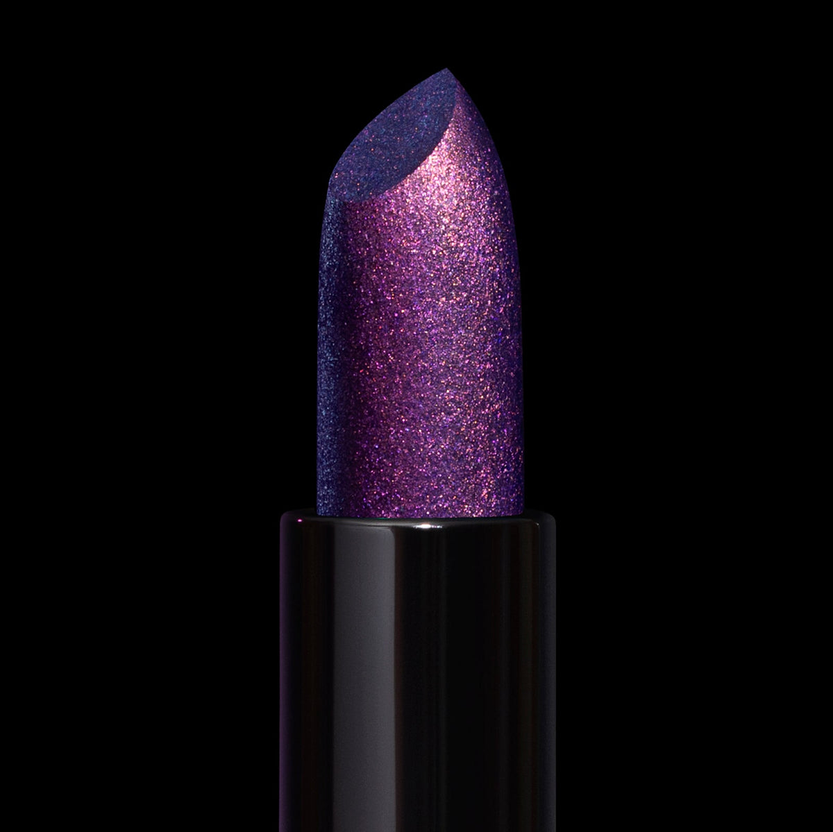 Final Cut bullet close-up: violet base with dense pink sparkle and a blue sheen at the cut edge